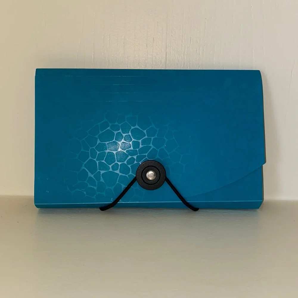Small accordion folder.